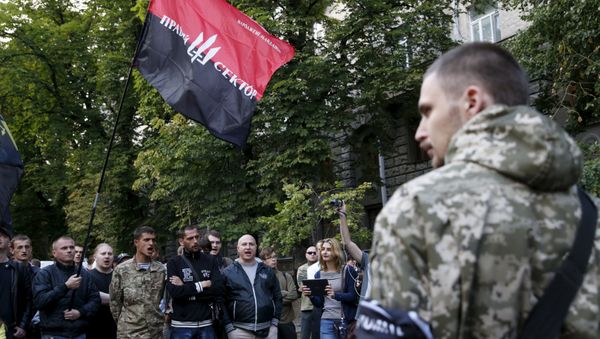 Protesters shout slogans at the parliament building in Kiev, Ukraine, July 11, 2015. Ukraine's President Petro Poroshenko has instructed law enforcement agencies to disarm and detain those who staged the shoot-out in the town of Mukacheve, Zakarpattia region, which left several people wounded and some reportedly killed, local media reported - Sputnik International