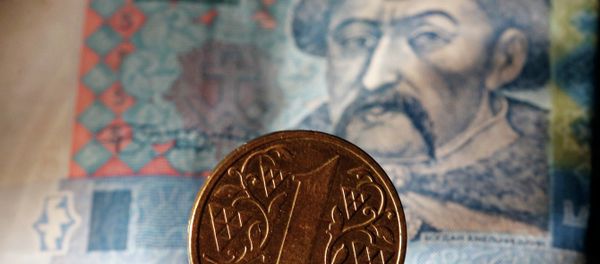 Ukrainian notes and hryvnia coin. Ukrainian notes and hryvnia coin. - Sputnik International