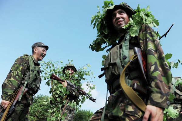 Ukrainian servicemen wearing camouflage take part in a military drill with US troops in Yavoriv polygon, Lviv district, western Ukraine, on July 22, 2015 Ukrainian servicemen wearing camouflage take part in a military drill with US troops in Yavoriv polygon, Lviv district, western Ukraine, on July 22, 2015 - Sputnik International