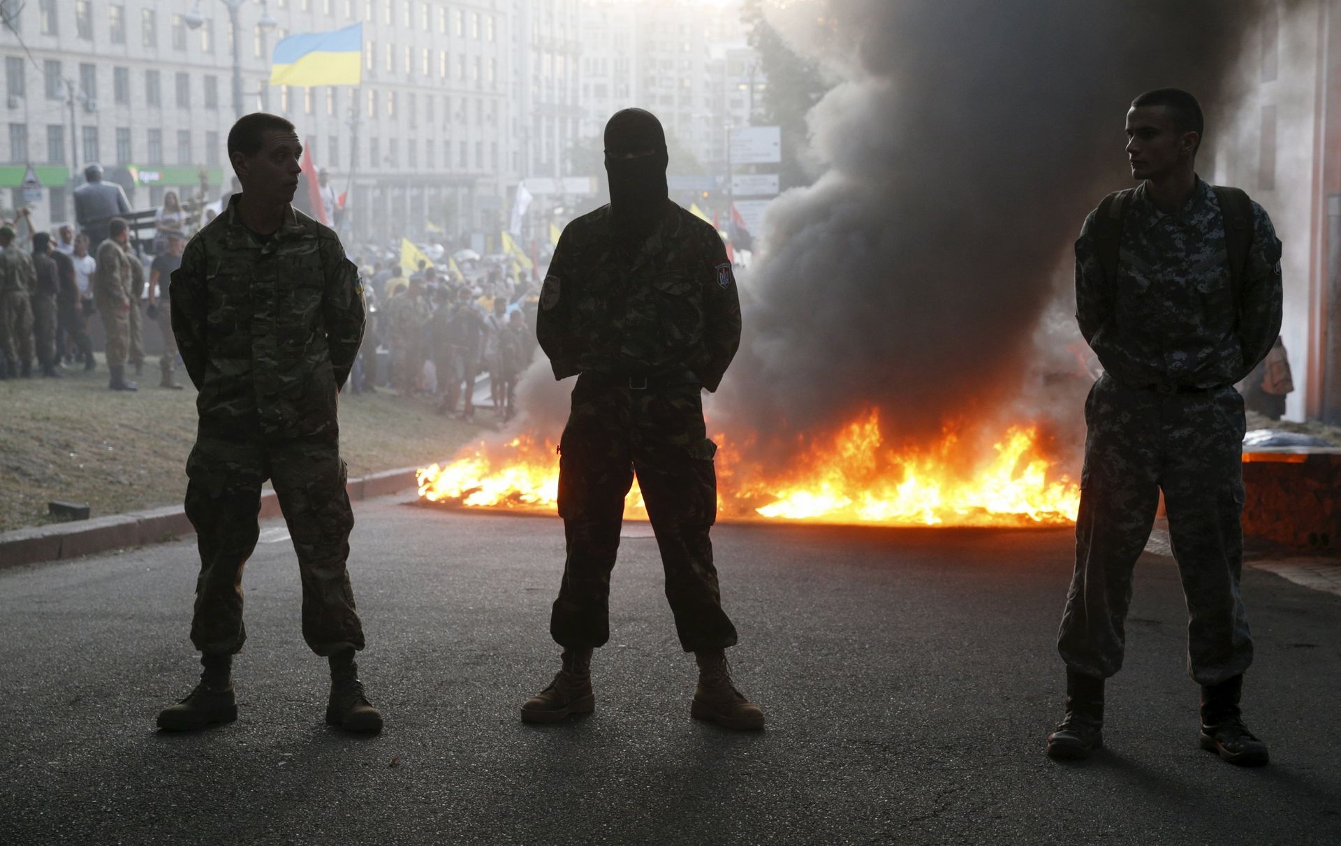 Tyres are set on fire during a rally held by members of the far-right radical group Right Sector, representatives of the Ukrainian volunteer corps and their supporters in central Kiev, Ukraine Tyres are set on fire during a rally held by members of the far-right radical group Right Sector, representatives of the Ukrainian volunteer corps and their supporters in central Kiev, Ukraine - Sputnik International, 1920, 28.02.2022