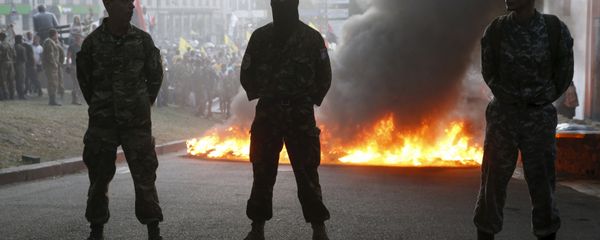 Tyres are set on fire during a rally held by members of the far-right radical group Right Sector, representatives of the Ukrainian volunteer corps and their supporters in central Kiev, Ukraine Tyres are set on fire during a rally held by members of the far-right radical group Right Sector, representatives of the Ukrainian volunteer corps and their supporters in central Kiev, Ukraine - Sputnik International