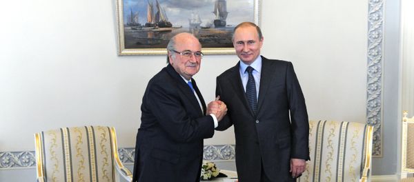 Russian President Vladimir Putin and FIFA head Joseph Blatter Russian President Vladimir Putin and FIFA head Joseph Blatter - Sputnik International