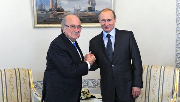 Russian President Vladimir Putin and FIFA head Joseph Blatter Russian President Vladimir Putin and FIFA head Joseph Blatter - Sputnik International