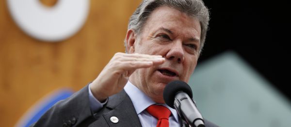 Colombia's President Juan Manuel Santos delivers his speech as he visits the Colombian pavilion at the 2015 Expo in Rho, near Milan, Italy, Friday, June 12, 2015. - Sputnik International
