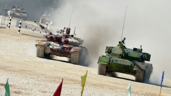 From right: Chinese and Russian crews ride Type 96A and T-72B tanks during a pursuit race of the Tank Biathlon 2014 World Championships at a training center of the Second Guards Taman Motorized Rifle Division in the town of Alabino From right: Chinese and Russian crews ride Type 96A and T-72B tanks during a pursuit race of the Tank Biathlon 2014 World Championships at a training center of the Second Guards Taman Motorized Rifle Division in the town of Alabino - Sputnik International