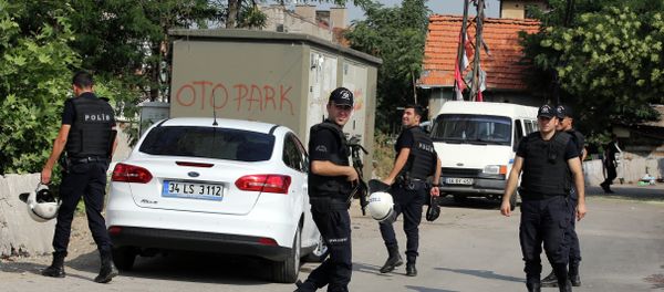 Police officers patrol as Turkish police raide homes in Haci Bayram neighborhood in the capital Ankara, Turkey, Monday, July 27, 2015 Police officers patrol as Turkish police raide homes in Haci Bayram neighborhood in the capital Ankara, Turkey, Monday, July 27, 2015 - Sputnik International
