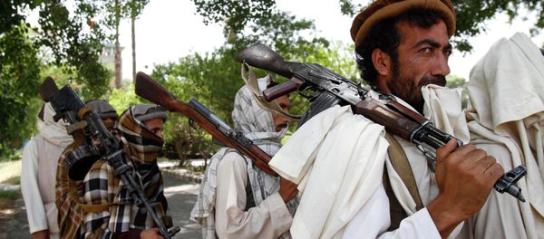 Taliban fighters hold their heavy and light weapons before surrendering them to Afghan authorities in Jalalabad, east of Kabul, Afghanistan. File photo Taliban fighters hold their heavy and light weapons before surrendering them to Afghan authorities in Jalalabad, east of Kabul, Afghanistan. File photo - Sputnik International