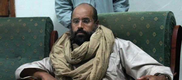 Seif al-Islam is seen after his capture in the custody of revolutionary fighters in Zintan Seif al-Islam is seen after his capture in the custody of revolutionary fighters in Zintan - Sputnik International