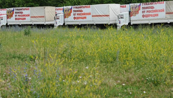 Trucks with humanitarian aid for southeastern Ukraine in the village of Kovalyovka, the Rostov Region - Sputnik International