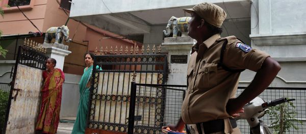 A policeman stands outside the residence of one of the four Indian nationals who was detained near the Libyan city of Sirte, in Hyderabad, India A policeman stands outside the residence of one of the four Indian nationals who was detained near the Libyan city of Sirte, in Hyderabad, India - Sputnik International