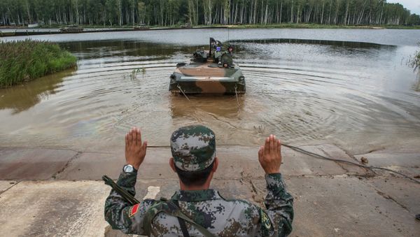 A Chinese soldier takes part in training sessions during the International Army Games-2015 at the Alabino training center in the Moscow Region - Sputnik International