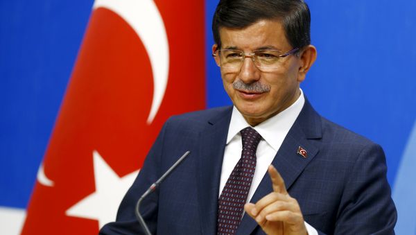 Turkey's Prime Minister Ahmet Davutoglu speaks during a news conference at his ruling AK Party (AKP) headquarters in Ankara, Turkey, July 13, 2015 - Sputnik International