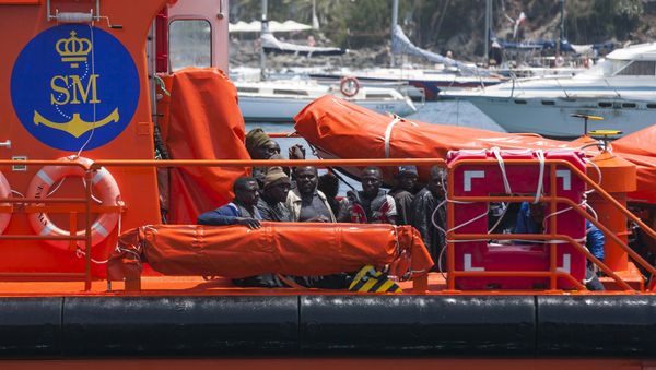 African migrants rest on board a Spanish rescue boat after arriving at Arguineguin port in the Canary Island Gran Canaria, Spain, July 13, 2015 - Sputnik International