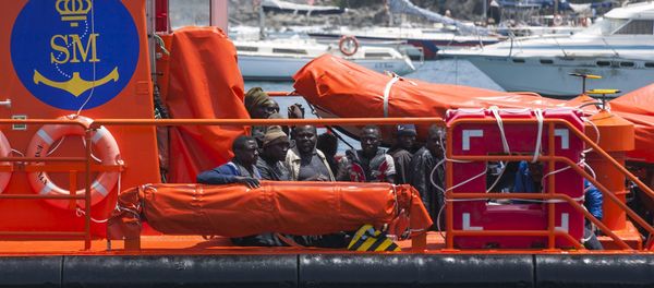 African migrants rest on board a Spanish rescue boat after arriving at Arguineguin port in the Canary Island Gran Canaria, Spain, July 13, 2015 - Sputnik International