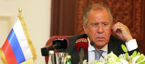 Russia's Foreign Minister Sergey Lavrov listens during a joint press conference with Qatari Foreign Minister Khalid bin Mohammad Al-Attiyah (unseen) on August 3, 2015 in Doha Russia's Foreign Minister Sergey Lavrov listens during a joint press conference with Qatari Foreign Minister Khalid bin Mohammad Al-Attiyah (unseen) on August 3, 2015 in Doha - Sputnik International