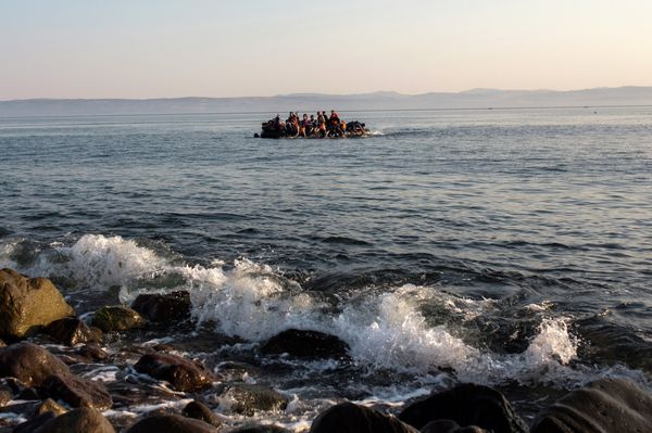 Migrants from Syria and Afghanistan arrive on an overcrowded dinghy from the Turkish coasts to the Greek island of Lesbos, Monday, July 27, 2015 Migrants from Syria and Afghanistan arrive on an overcrowded dinghy from the Turkish coasts to the Greek island of Lesbos, Monday, July 27, 2015 - Sputnik International