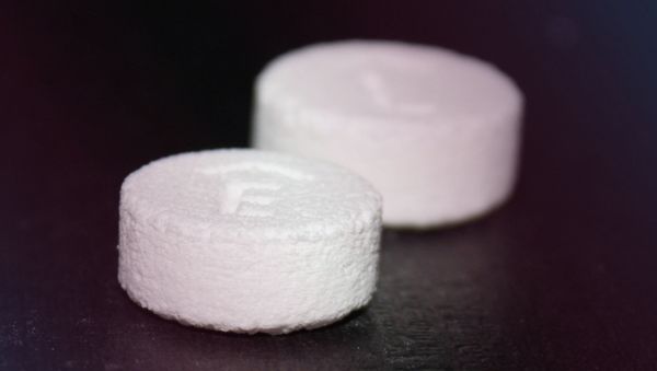 This product image provided by Aprecia Pharmaceuticals shows Spritam 750 mg, foreground, and 1000 mg tablets. - Sputnik International