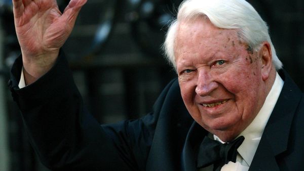Former British Prime Minister Edward Heath waves as he arrives at number 10 Downing Street in London in this file photo dated April 29, 2002 - Sputnik International