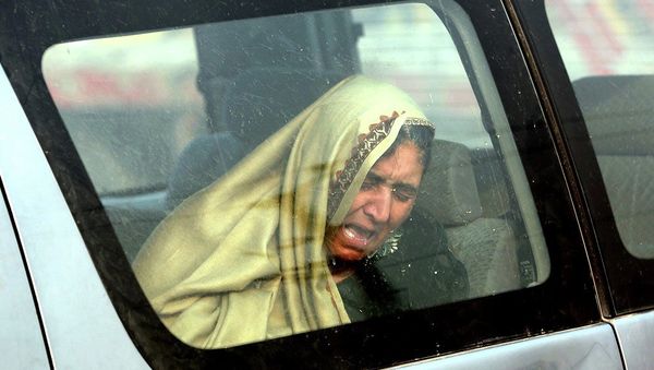 An Afghan woman cries at the site of a suicide attack in Kabul, Afghanistan Monday, Jan. 5, 2015. An Afghan woman cries at the site of a suicide attack in Kabul, Afghanistan Monday, Jan. 5, 2015. - Sputnik International