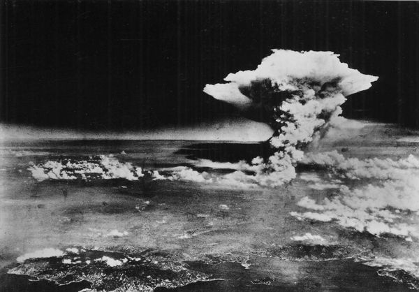 An atomic cloud billows above Hiroshima city following the explosion of the first atomic bomb to be used in warfare in Hiroshima, in this handout photo taken by the US Army on August 6, 1945, and distributed by the Hiroshima Peace Memorial Museum. - Sputnik International
