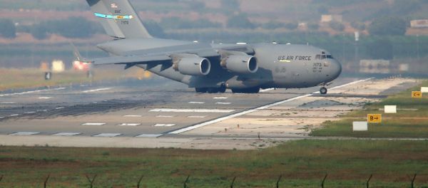 A United States Air Force cargo plane maneuvers on the runway after it landed at the Incirlik Air Base, on the outskirts of the city of Adana, southern Turkey, Friday, July 31, 2015 A United States Air Force cargo plane maneuvers on the runway after it landed at the Incirlik Air Base, on the outskirts of the city of Adana, southern Turkey, Friday, July 31, 2015 - Sputnik International
