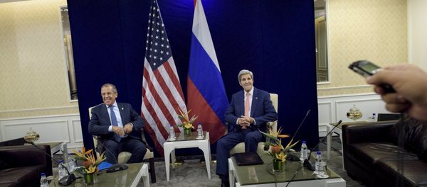Russia's Foreign Minister Sergei Lavrov (L) and U.S. Secretary of State John Kerry sit next to each other before a bilateral meeting in Kuala Lumpur, Malaysia August 5, 2015 Russia's Foreign Minister Sergei Lavrov (L) and U.S. Secretary of State John Kerry sit next to each other before a bilateral meeting in Kuala Lumpur, Malaysia August 5, 2015 - Sputnik International
