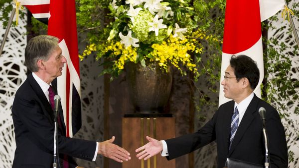 Japan's Foreign Minister Fumio Kishida (R) shakes hands with British Foreign Secretary Philip Hammond after a news conference about the 4th UK-Japan Strategic Dialogue at Iikura House in Tokyo Japan's Foreign Minister Fumio Kishida (R) shakes hands with British Foreign Secretary Philip Hammond after a news conference about the 4th UK-Japan Strategic Dialogue at Iikura House in Tokyo - Sputnik International