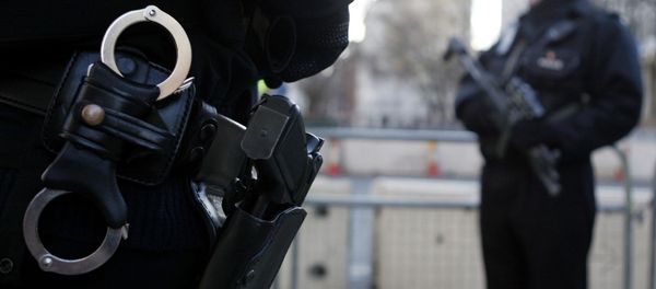 Armed policemen stand guard in Grosvenor Square in London. File photo Armed policemen stand guard in Grosvenor Square in London. File photo - Sputnik International