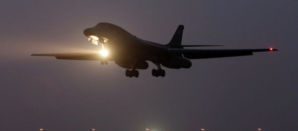 In this photo taken Monday, March 9, 2015, a B-1 bomber prepares to land after finishing a mission at the al-Udeid Air Base in Doha, Qatar - Sputnik International