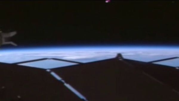 UFO spotted over ISS in NASA live stream footage. UFO spotted over ISS in NASA live stream footage. - Sputnik International