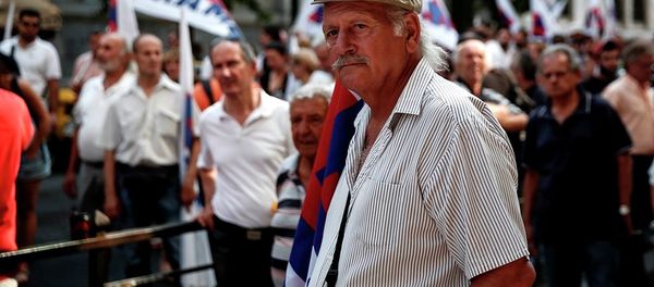Supporters of the Communist-affiliated PAME labor union take part in an anti-austerity rally outside the Labor Ministry in Athens, Greece, on Wednesday, Aug. 5, 2015. - Sputnik International