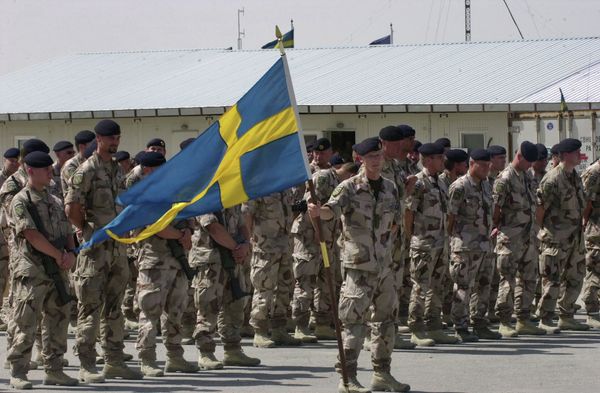 Swedish soldiers part of the International Security Assistant Force (ISAF) stand during a changing of command ceremony at the Swedish run Provincial Reconstruction Team in Mazar Sharif north of Kabul, Afghanistan on Tuesday May 6, 2008 Swedish soldiers part of the International Security Assistant Force (ISAF) stand during a changing of command ceremony at the Swedish run Provincial Reconstruction Team in Mazar Sharif north of Kabul, Afghanistan on Tuesday May 6, 2008 - Sputnik International
