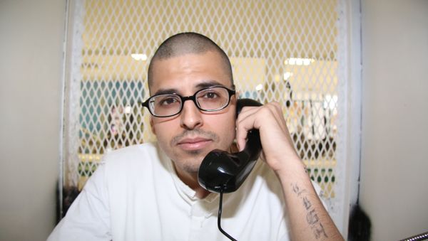 In this Aug. 5, 2015 photo, Daniel Lee Lopez, 27, speaks from a visiting cage outside death row at the Texas Department of Criminal Justice Polunsky Unit near Livingston, Texas In this Aug. 5, 2015 photo, Daniel Lee Lopez, 27, speaks from a visiting cage outside death row at the Texas Department of Criminal Justice Polunsky Unit near Livingston, Texas - Sputnik International