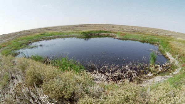 A lake in the place of a surface nuclear explosion on the Semipalatinsk proving ground - Sputnik International