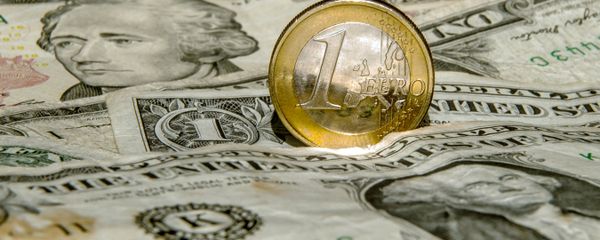 A one euro coin is pictured on one US dollar notes - Sputnik International