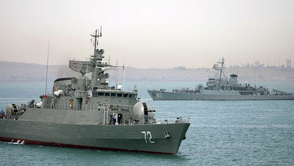 Iranian warship Alborz, foreground, prepares before leaving Iran's waters. Iranian warship Alborz, foreground, prepares before leaving Iran's waters. - Sputnik International