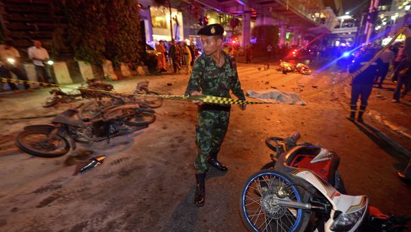 A Thai soldier ropes off the scene after a bomb exploded outside a religious shrine in central Bangkok A Thai soldier ropes off the scene after a bomb exploded outside a religious shrine in central Bangkok - Sputnik International