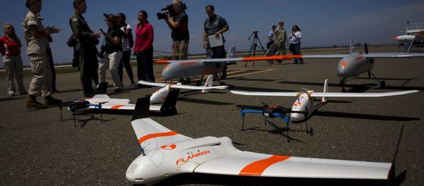 FireFlight UAS unmanned aerial vehicles TwinHawk, Scout, Flanker, and Hawkeye 400, are displayed on the tarmac during Black Dart, a live-fly, live fire demonstration of 55 unmanned aerial vehicles, or drones, at Naval Base Ventura County Sea Range, Point Mugu, near Oxnard, California July 31, 2015 FireFlight UAS unmanned aerial vehicles TwinHawk, Scout, Flanker, and Hawkeye 400, are displayed on the tarmac during Black Dart, a live-fly, live fire demonstration of 55 unmanned aerial vehicles, or drones, at Naval Base Ventura County Sea Range, Point Mugu, near Oxnard, California July 31, 2015 - Sputnik International