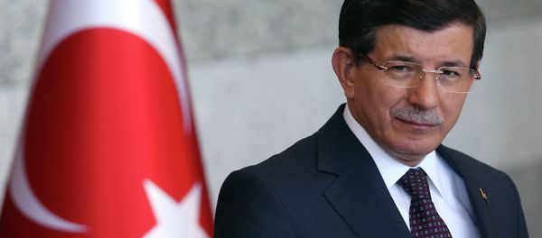 Turkish Prime Minister Ahmet Davutoglu pauses as he speaks to the media in Ankara, Turkey - Sputnik International