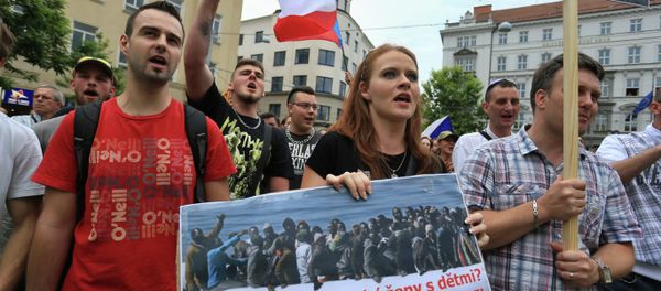 Ant-migrants protesters attend an anti-Islam and immigration rally on June 26, 2015 in Brno, Czech Republic - Sputnik International
