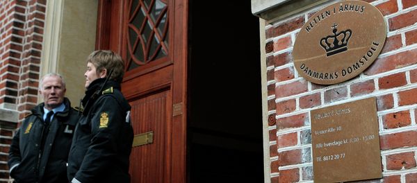 Two police officers stand outside the courthouse in Aarhus, Denmark Two police officers stand outside the courthouse in Aarhus, Denmark - Sputnik International