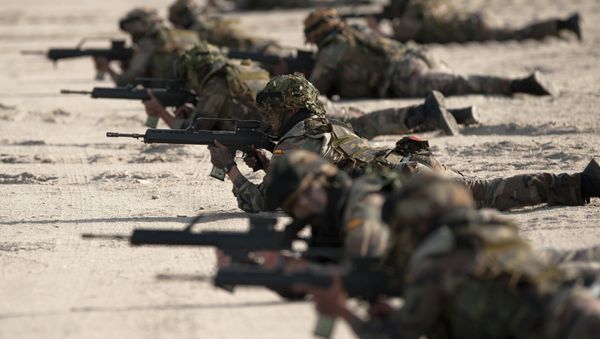 Spanish Navy Marines take positions during a military exercise in the Garrucha beach near Almeria, Spain - Sputnik International