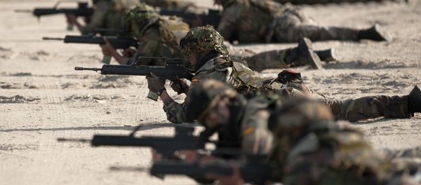 Spanish Navy Marines take positions during a military exercise in the Garrucha beach near Almeria, Spain Spanish Navy Marines take positions during a military exercise in the Garrucha beach near Almeria, Spain - Sputnik International