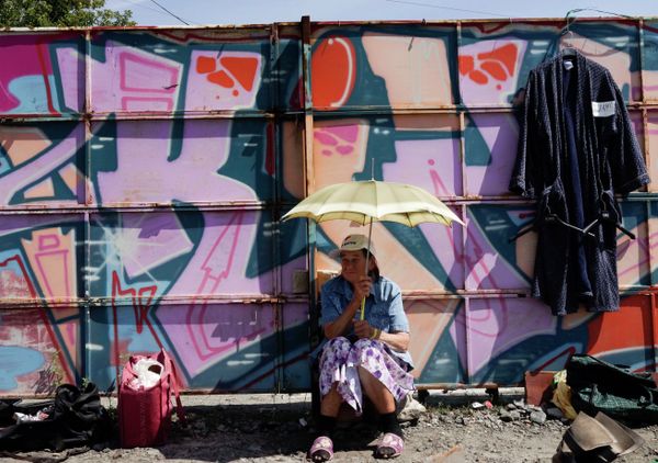 A woman sells her belongings in a city flea market in an attempt to survive in a financial crisis in Ukraine's capital Kiev Sunday, Aug. 2, 2015 A woman sells her belongings in a city flea market in an attempt to survive in a financial crisis in Ukraine's capital Kiev Sunday, Aug. 2, 2015 - Sputnik International