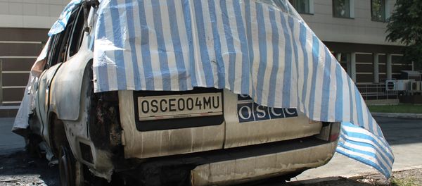 Six OSCE mission cars burned in Donetsk - Sputnik International