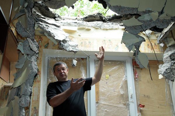 Aftermath of artillery attack on Donetsk - Sputnik International