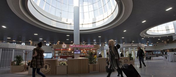 Passengers inside the renovated Pulkovo-1 airport terminal. Passengers inside the renovated Pulkovo-1 airport terminal. - Sputnik International