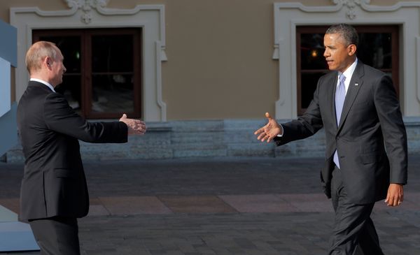 Russia's President Vladimir Putin, left, reaches out to shake hands with U.S. President Barack Obama during arrivals for the G-20 summit at the Konstantin Palace in St. Petersburg, Russia on Thursday, Sept. 5, 2013 Russia's President Vladimir Putin, left, reaches out to shake hands with U.S. President Barack Obama during arrivals for the G-20 summit at the Konstantin Palace in St. Petersburg, Russia on Thursday, Sept. 5, 2013 - Sputnik International