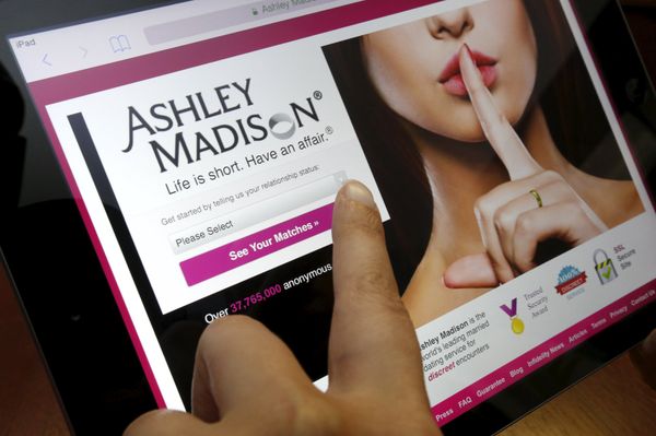 The homepage of the Ashley Madison website is displayed on an iPad, in this photo illustration taken in Ottawa, Canada July 21, 2015 - Sputnik International