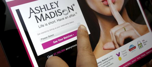 The homepage of the Ashley Madison website is displayed on an iPad, in this photo illustration taken in Ottawa, Canada July 21, 2015 The homepage of the Ashley Madison website is displayed on an iPad, in this photo illustration taken in Ottawa, Canada July 21, 2015 - Sputnik International